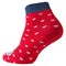 Red volumetric sock with hearts, turned back side, on a white background