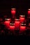 Red votive candles with burning flame