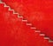 Red wall with stairs texture background, minimalistic style