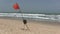 Red warning flag flying on a desert