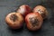 Red washed beetroot on a black table, close-up