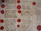 Red wax seals with historic signatures
