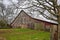 A red weathered barn