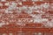 Red Weathered Brick Background with White Paint Spots