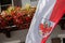 The red and white Alto Adige regional flag is on the wind during the local celebration