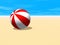 Red and white beach ball