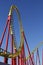 red and white and blue. 360 degree loop at the roller coaster