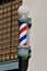 Red, white , and blue barber pole