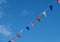Red, white and blue bunting with Union Jack across deep blue sky