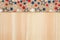 Red, white and blue stars burlap ribbon on wood background