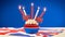 Red white and blue theme cupcakes and cake stand with UK Union Jack flags