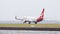 Red-white Boeing 737 Qantas Airways