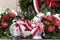 Red and white candles and flowers in the colors of the Polish flag, national anniversary in Poland. Polish national colors