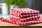 red and white checkered kitchen towels folded neatly