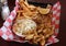 Red and white checkered napkin in basket holding fresh seafood platter