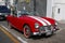 Red and white convertible Austin-Healey Sprite in Lima