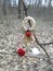 Red and white crocheted flowers martisor with ladybug