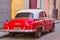 Red and White Fifties Model Chevrolet in Old Havana