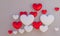 Red and white heart on fabric background, valentines concept