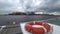 Red and white lifebuoy on the boat in Neva river, Saint-Petersburg, Russia