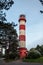Red-white lighthouse on the Curonian Spit in Nida