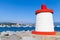 Red and white lighthouse tower, Corsica, France