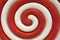 Red and white lollipop swirl background