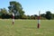 Red and white marked polo goal posts