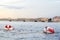 Red and white metal mooring buoys.