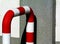 Red and white painted steel bumper bollard