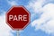 Red and white Pare stop sign