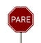 Red and white Pare stop sign