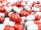 Red and white pills closeup. 3d rendering