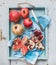 Red and white pomegranates with knife on kitchen