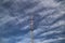 Red And White Radio Tower In Unusual Angle