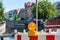 Red and white street barriers with flashlight to secure a construction site, roadworks, road under construction. Temporary fencing