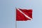 Red with white stripe flag used by lifeguards