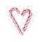 Red and white striped candy cane sticks heart shape