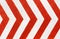 Red and white stripes closeup background. Painted concrete wall