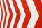 Red and white stripes closeup background. Painted concrete wall
