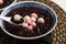 Red and white tangyuan with red bean soup