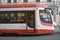 A red and white tramway on the street