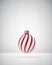 Red and white twisted striped Christmas ball