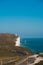 Red and whiteâ€“striped Beachy Head Lighthouse against chalk cliffs,  view from top of Seven Sisters, Clifftop Paths Nature