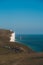 Red and whiteâ€“striped Beachy Head Lighthouse against chalk cliffs,  view from top of Seven Sisters, Clifftop Paths Nature