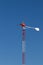 Red windmill generates electricity