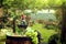 Red wine with barrel on vineyard in green Tuscany, Italy