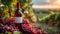 A red wine bottle in front of a landscape of grape farmland.