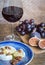 Red wine with camembert, figs and grapes