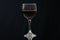 Red wine glass with black background